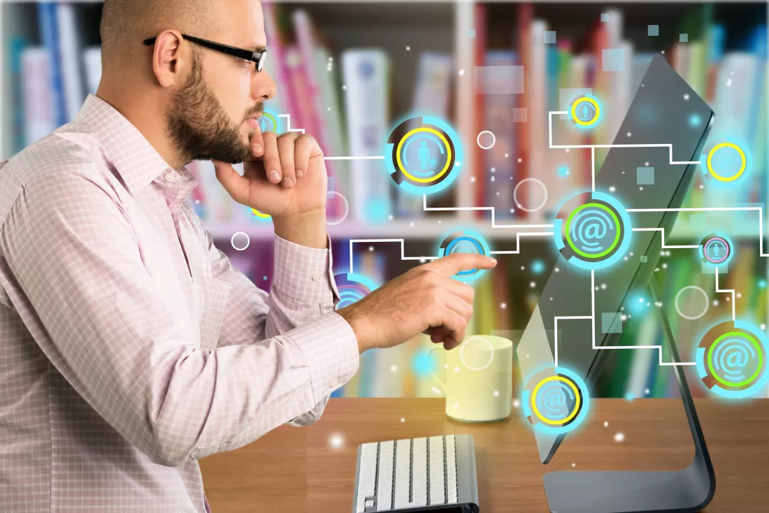 handsome-businessman-is-working-computer-office