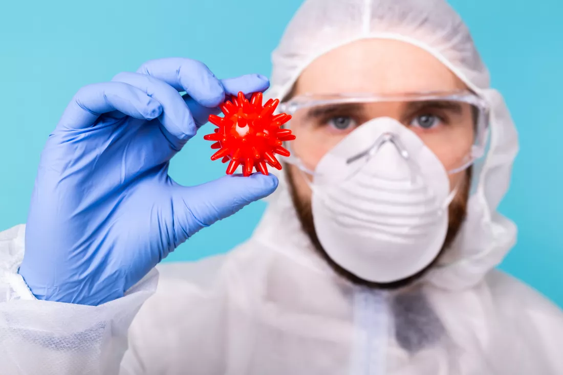 covid-19-vaccine-development-medicine-concept-man-scientist-doctor-dressed-personal-protective-equipment-holding-model-coronavirus